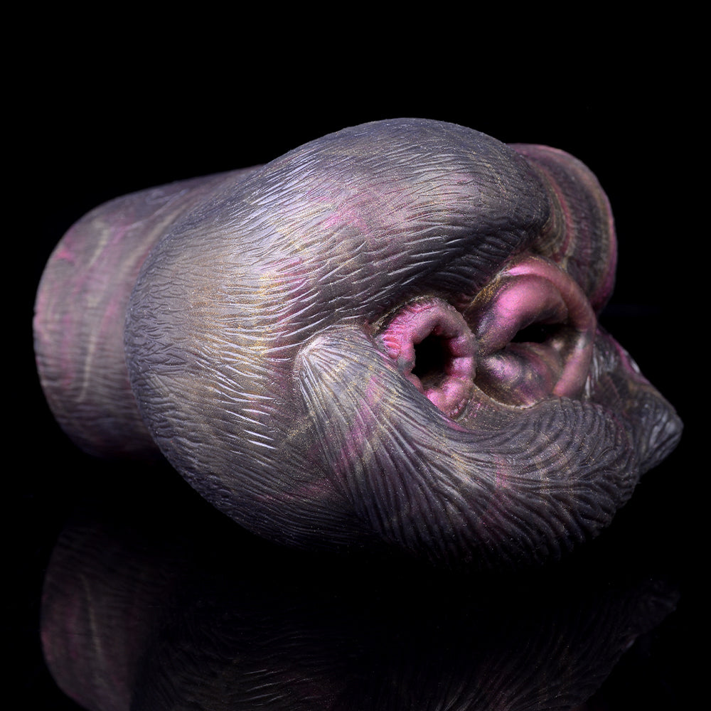 Side view of textured animal-style dual-hole sex toy