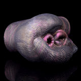 Side view of textured animal-style dual-hole sex toy