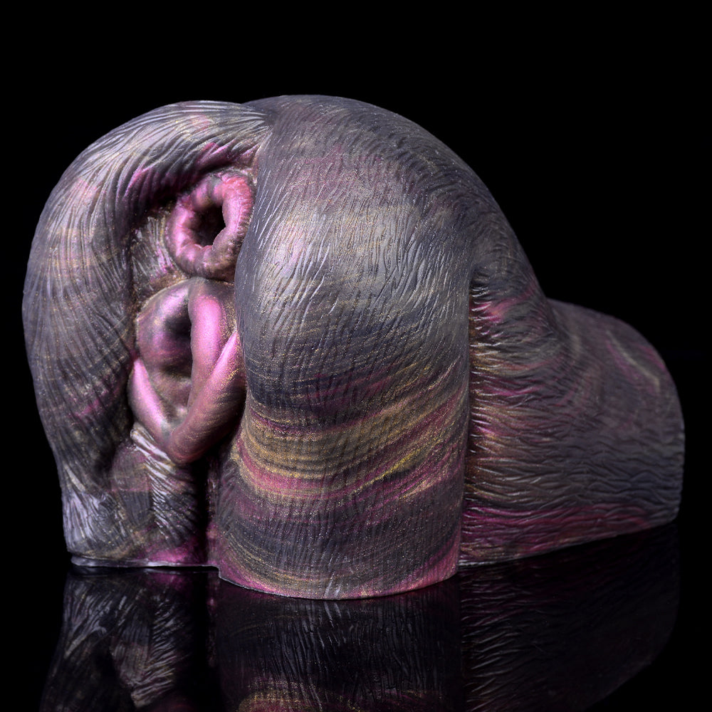 Animal-style dual-opening sex toy with visible openings from side angle