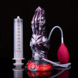 Knot dildo with clear tube and red bulb, beside measuring syringe