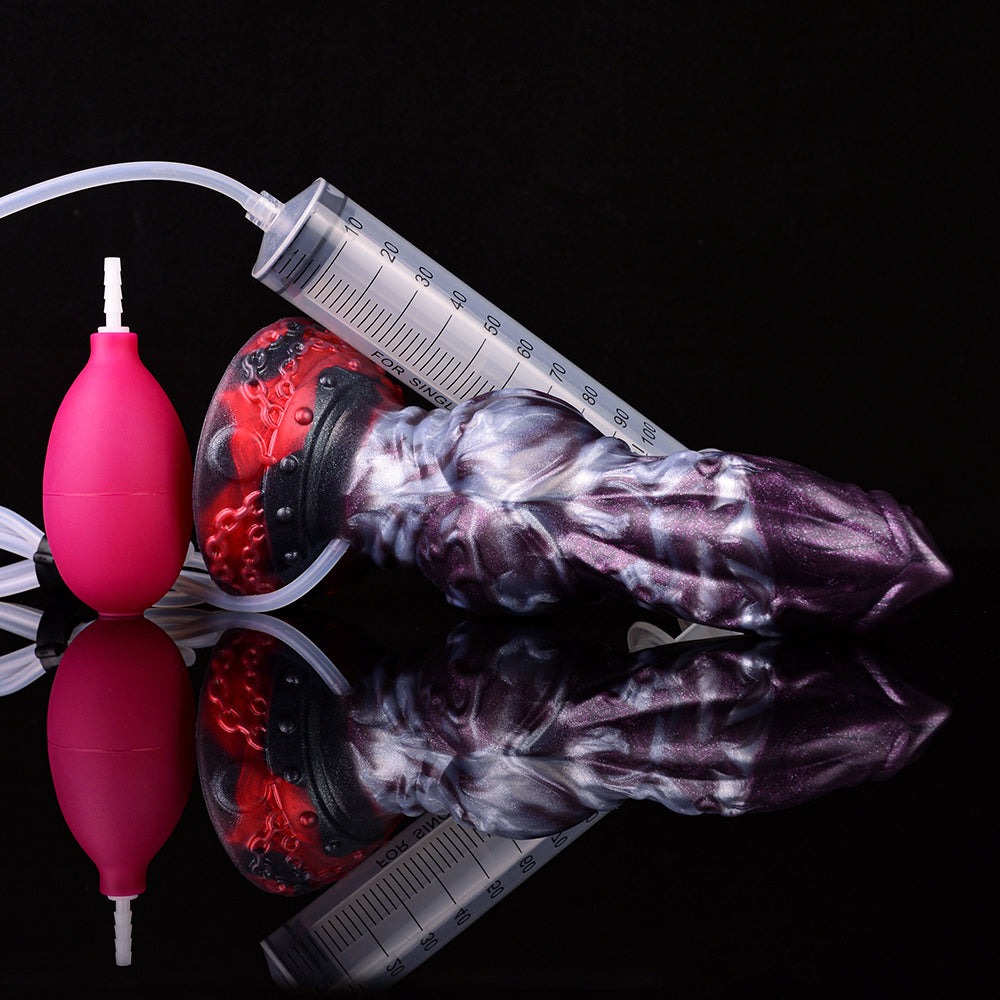 Purple-and-red knot dildo with syringe and two red squeeze bulbs