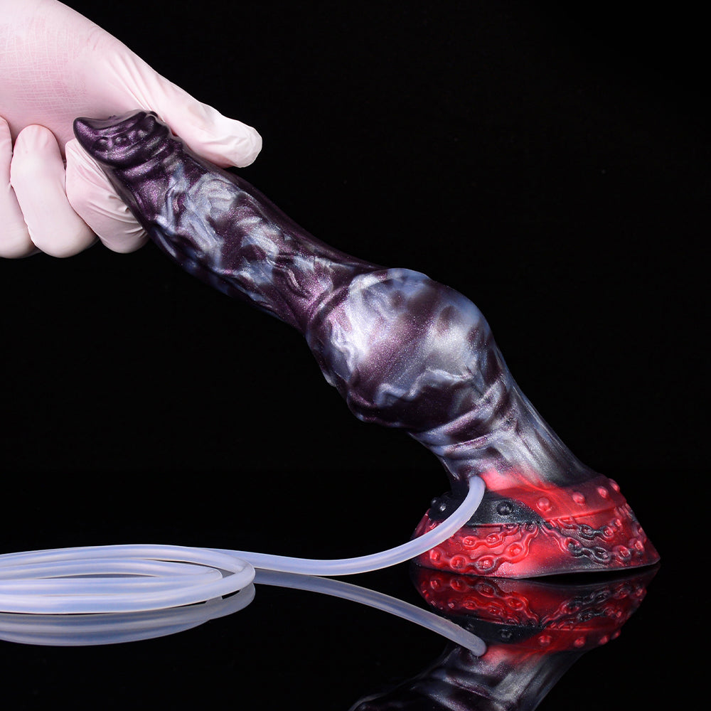 Side view of purple-and-red knot dildo with clear tube