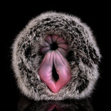 Furry dual-hole male masturbator with plush rim and twin openings