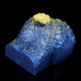 Blue sheep-shaped fantasy toy with yellow wool tuft, top view showing textured body