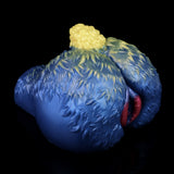 Sheep-themed adult toy with blue plush body, yellow head, red opening on side
