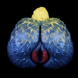 Sheep-themed adult toy with blue plush body, yellow head, red opening at center