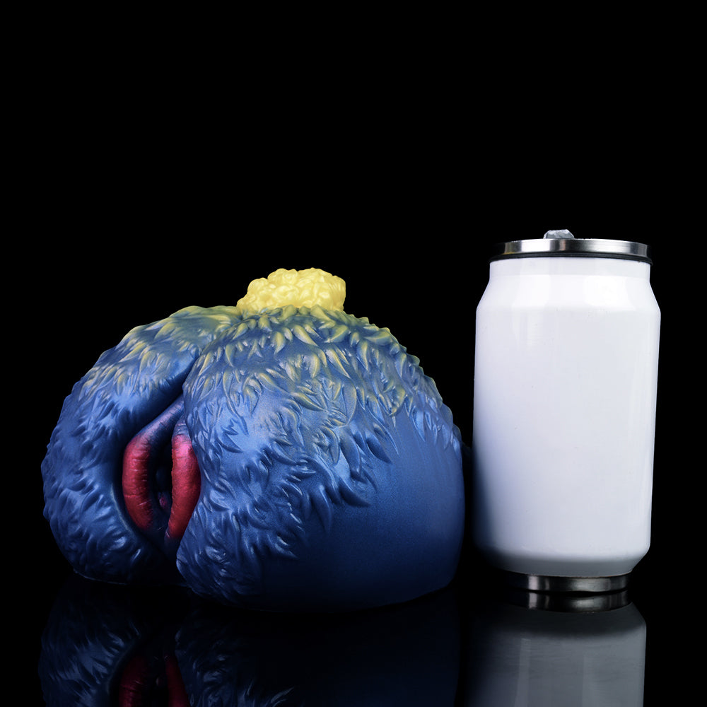 Blue sheep-shaped fantasy toy with yellow wool tuft and rear view; small seam details