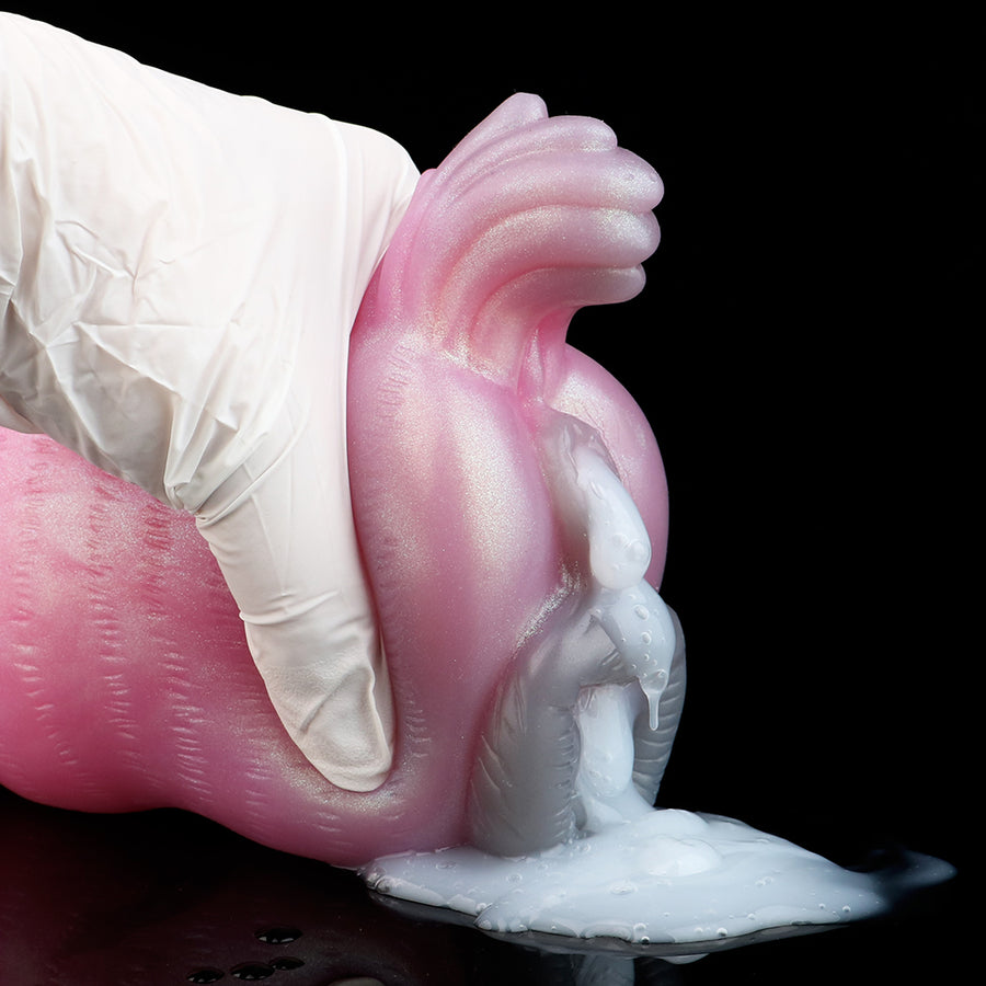 Pink fantasy animal-shaped adult toy with ribbed opening and white rim base