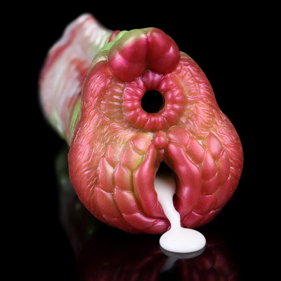 Dragon-themed silicone adult novelty masturbator, pink with green mane and open mouth