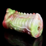 Fantasy dragon masturbator end view, white-and-green shaft with pink rim and side hole