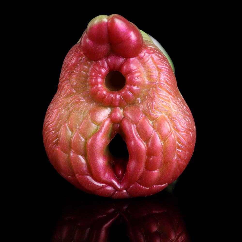 Fantasy dragon masturbator, front view: glossy pink-red face with two openings