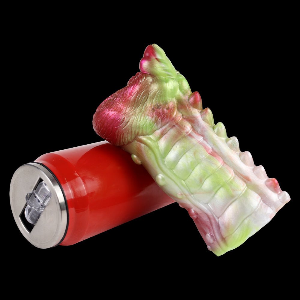 Dragon masturbator side angle, red base with ribbed white-green shaft and pink head