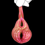 Pink dragon-shaped fantasy masturbator with two openings