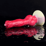 Roter Silikon-Vibrationskörper mit breitem Fuß und weißem Kopf