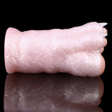 Cat paw stroker Seitenansicht, glatte zylindrische Form mit hellrosa Oberfläche