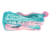 Celestial Tentacraze stroker underside view, teal and pink swirl channels