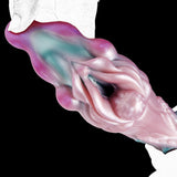 Celestial Tentacraze stroker front view, grooved tentacle-like detailing in pink/teal