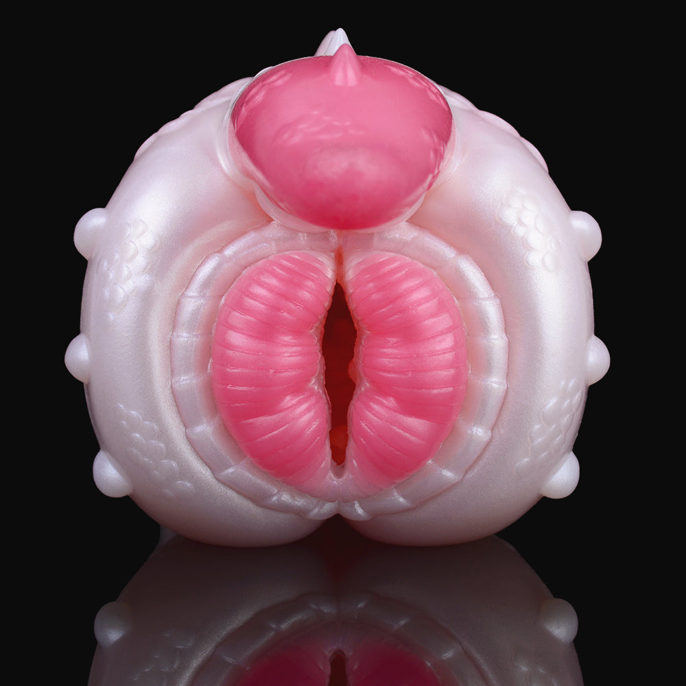Front view of dragon Fleshlight with central pink dome and two ribbed channels