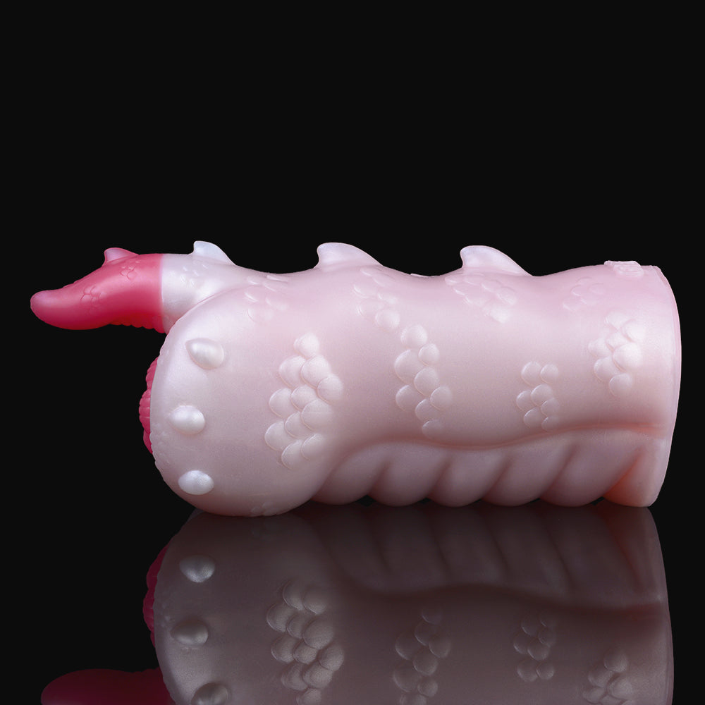 Ceratops dragon fleshlight, pale pink body with bumpy dots and spiky horn, side view