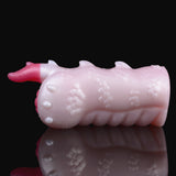 Ceratops dragon fleshlight, pale pink body with bumpy dots and spiky horn, side view