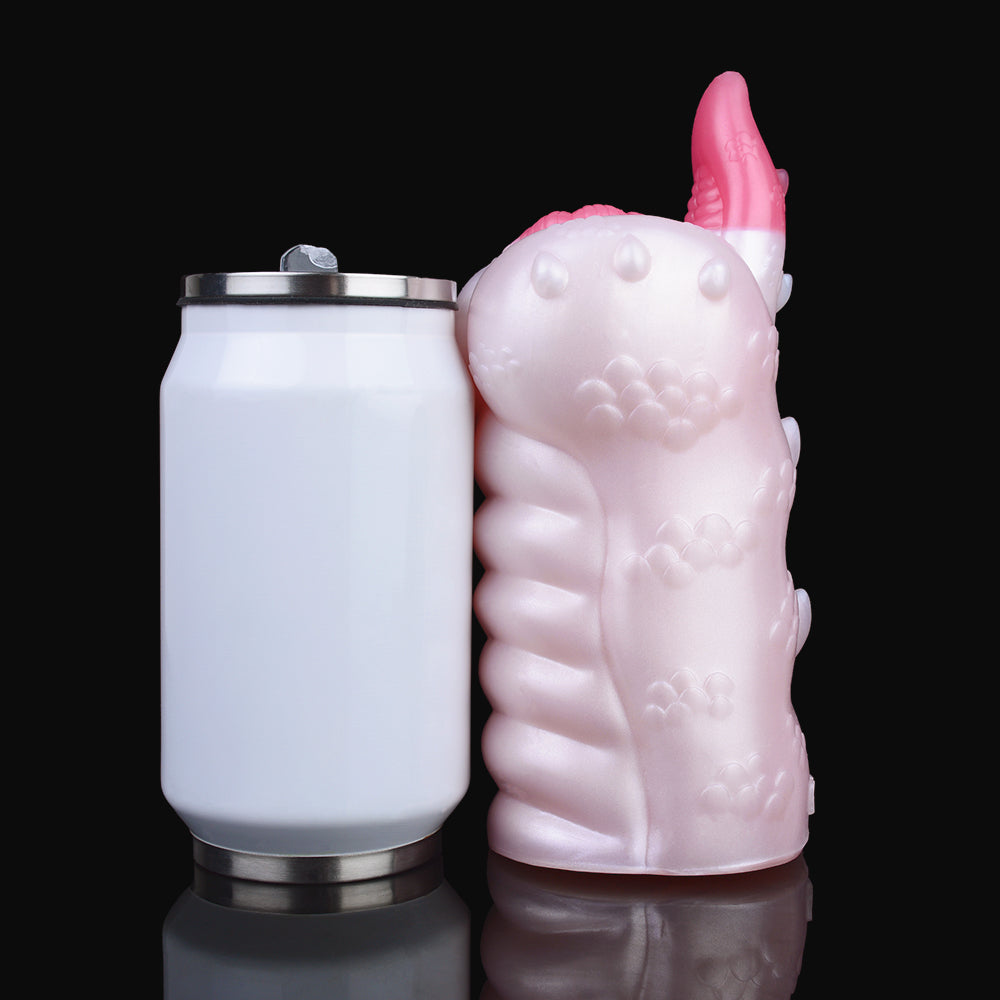 Dragon fleshlight with pink horn, pale pink dots and ridges, side close-up