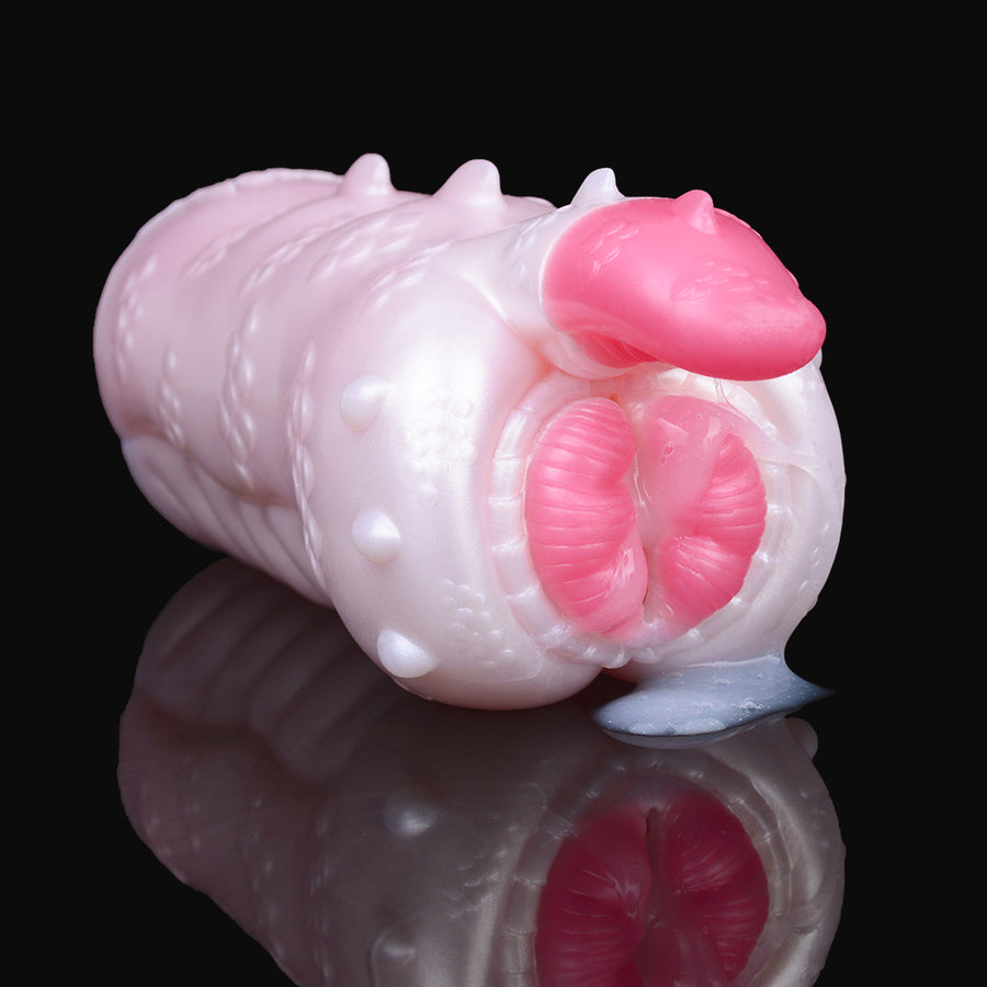 White dragon masturbator with pink spike tip and twin pink ribbed openings