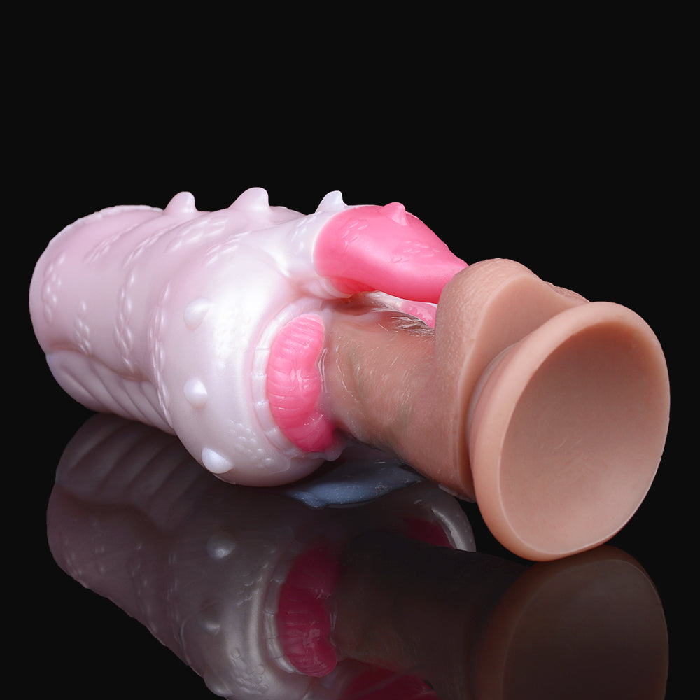 Open end of the pink-and-white dragon Fleshlight with two ribbed inner chambers