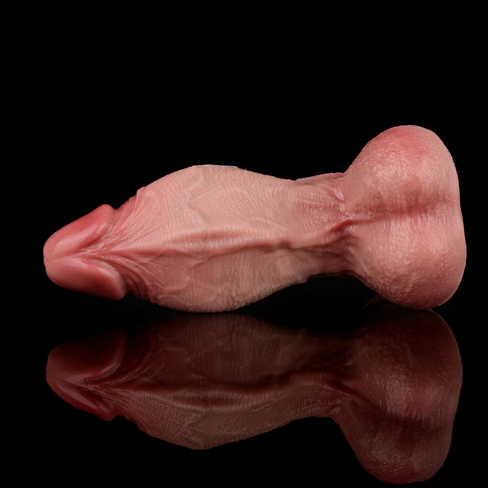 Realistic pink dildo lying down, textured shaft and rounded ends