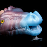 Close-up of blue-and-violet dragon fantasy sex toy, ridged mouth and textured body