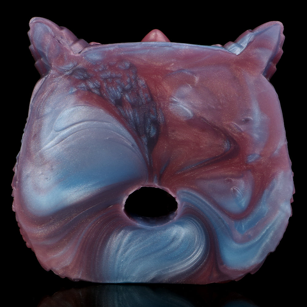 Blue-and-violet dragon fantasy sex toy head, circular opening visible on underside