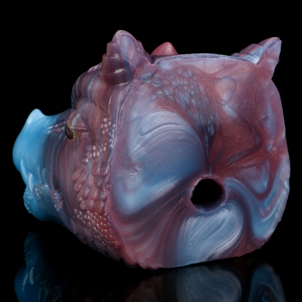 Rear view of blue/pink fantasy dragon one-hole masturbator with round opening