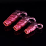 Three glossy pink monster sleeve extenders laid side by side, open ends upward