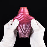 Fantasy monster sleeve front view, glossy pink metallic with rounded hood and cutout