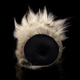 Faux-fur sleeve interior with dark circular base and central hole