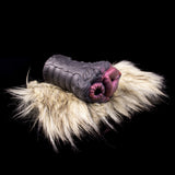 Black-gray silicone inner insert with textured ridges, inside cream faux-fur sleeve