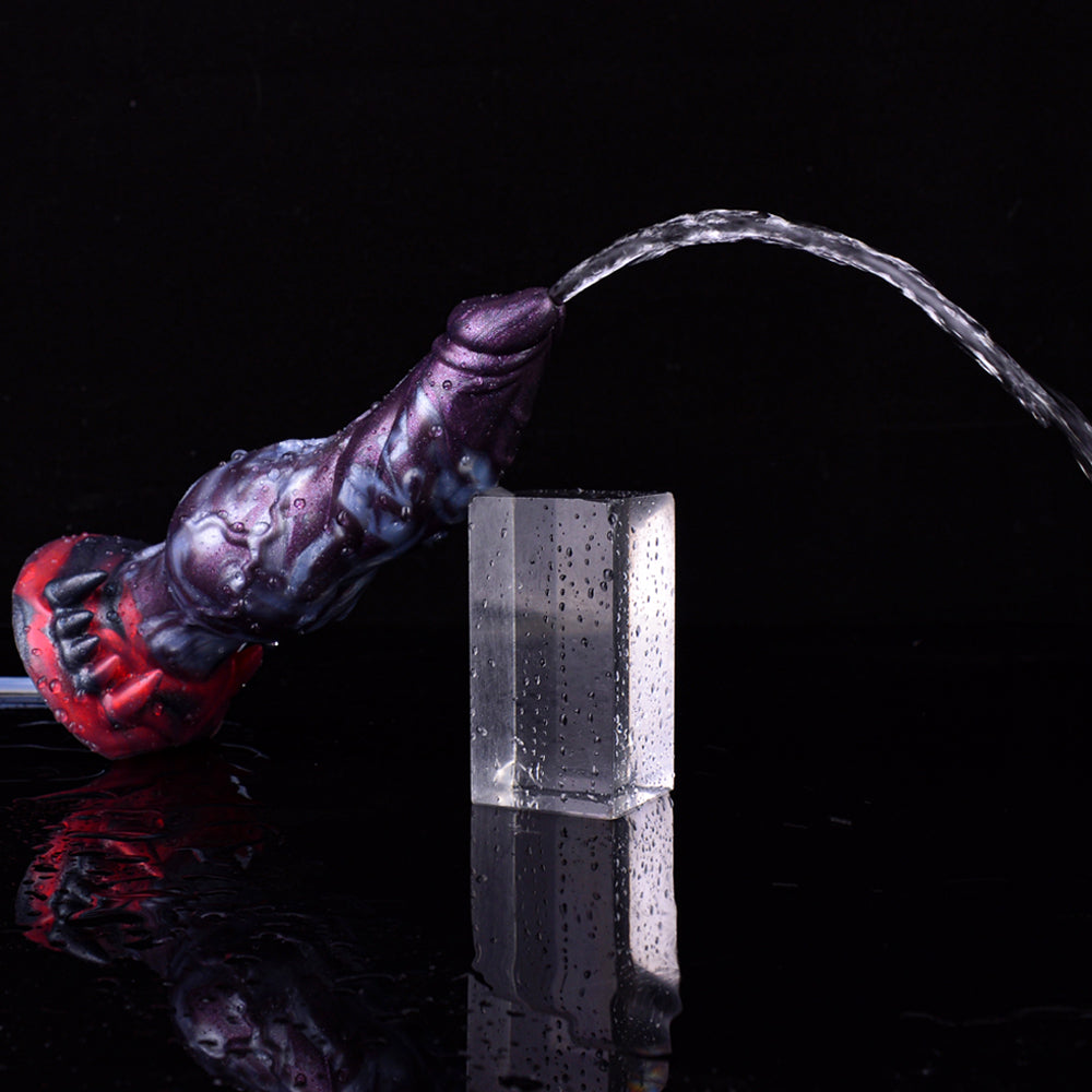 Purple monster squirting knot dildo with clear tube attached, red base