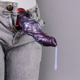 Monster squirting knot dildo in purple with red details and clear tube