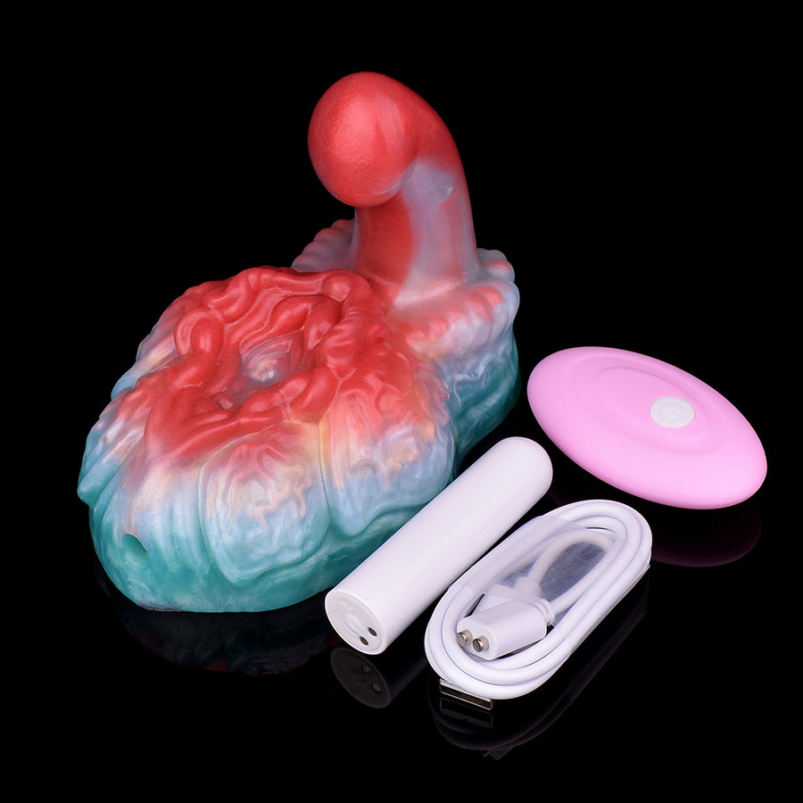 Swirled blue and pink silicone grinder toy with pink controller and USB cable set.