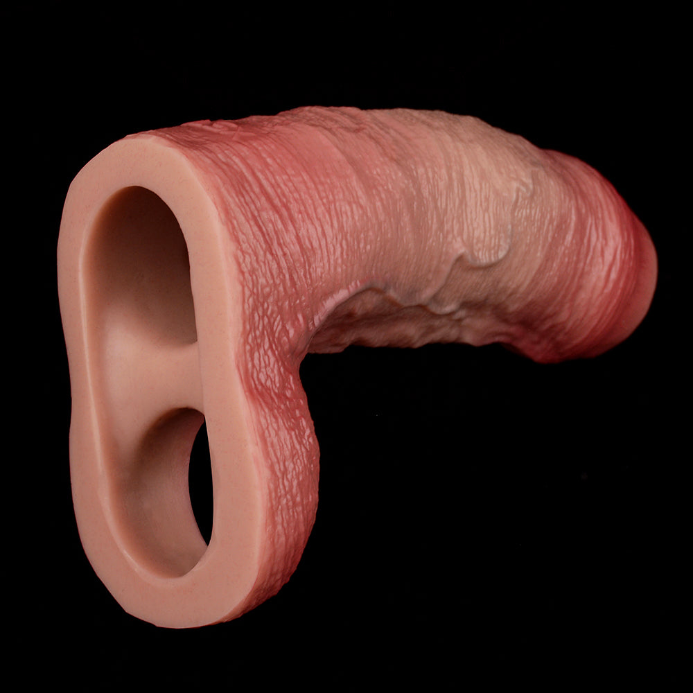 Realistic penis sleeve, ringed openings on pink textured silicone; side view.