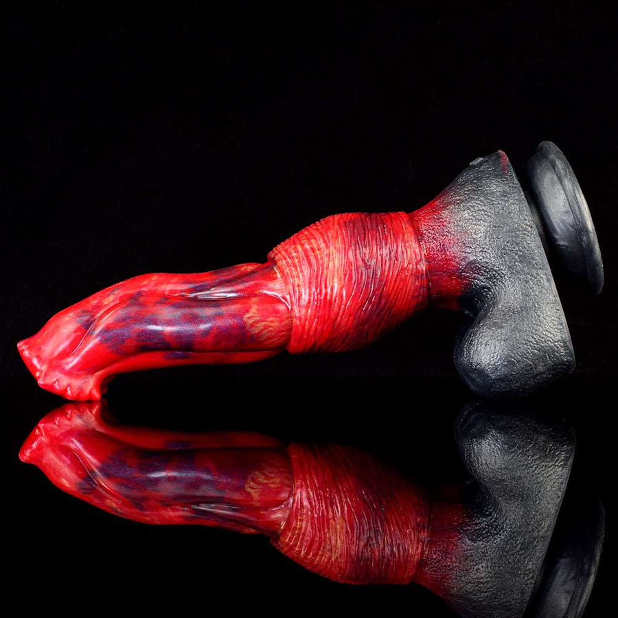 Side view of dragon dildo with red ribbed texture and dark flared base
