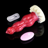Red double-knot vibrating dildo with white base, pink remote, and charging cable