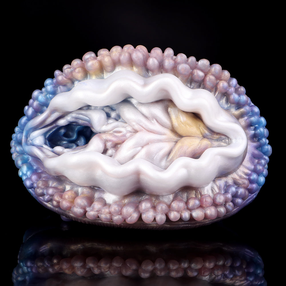 Deep Sea Clam masturbator, front view with wavy white inner channel and beads