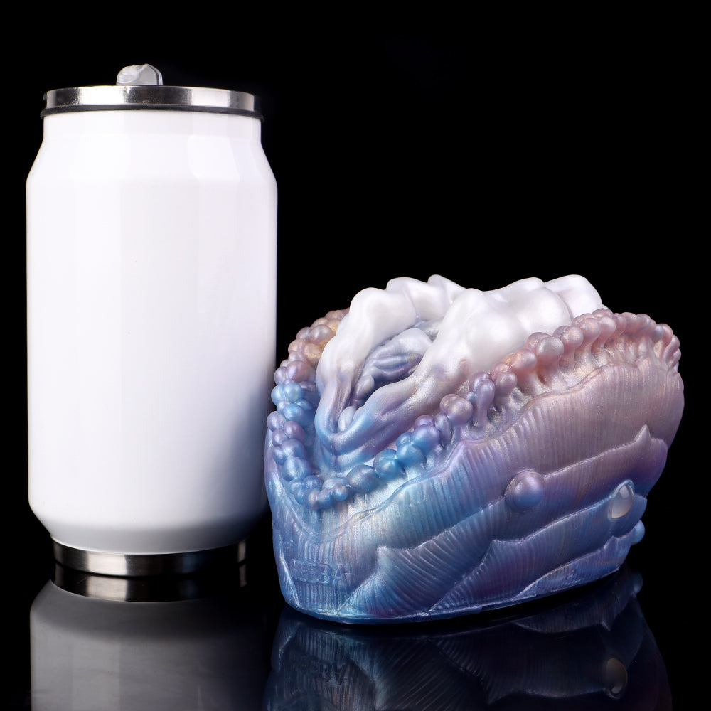 Deep Sea Clam masturbator with blue wavy body, white top tentacles, and bead trim