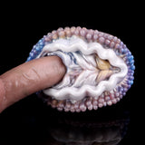 Deep Sea Clam masturbator, open white insert with wavy ridges
