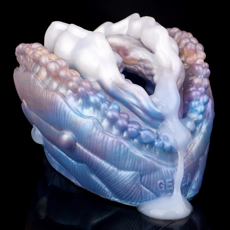 Clam-shaped pleasure toy, open shell side view in light blue with white inner channel