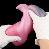 Pink deer stroker with white-gloved hands, front opening area visible