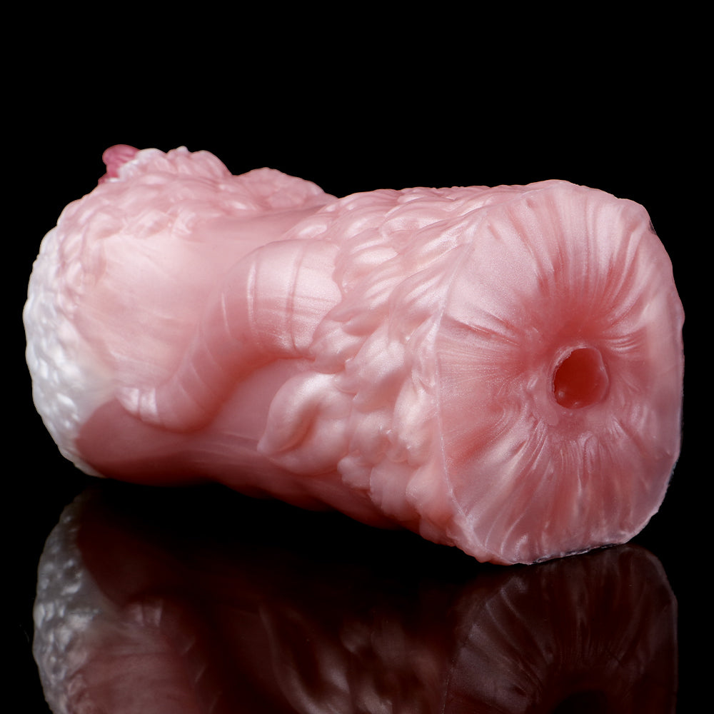 Dragon stroker end cap with circular opening, pink-white textured pattern.