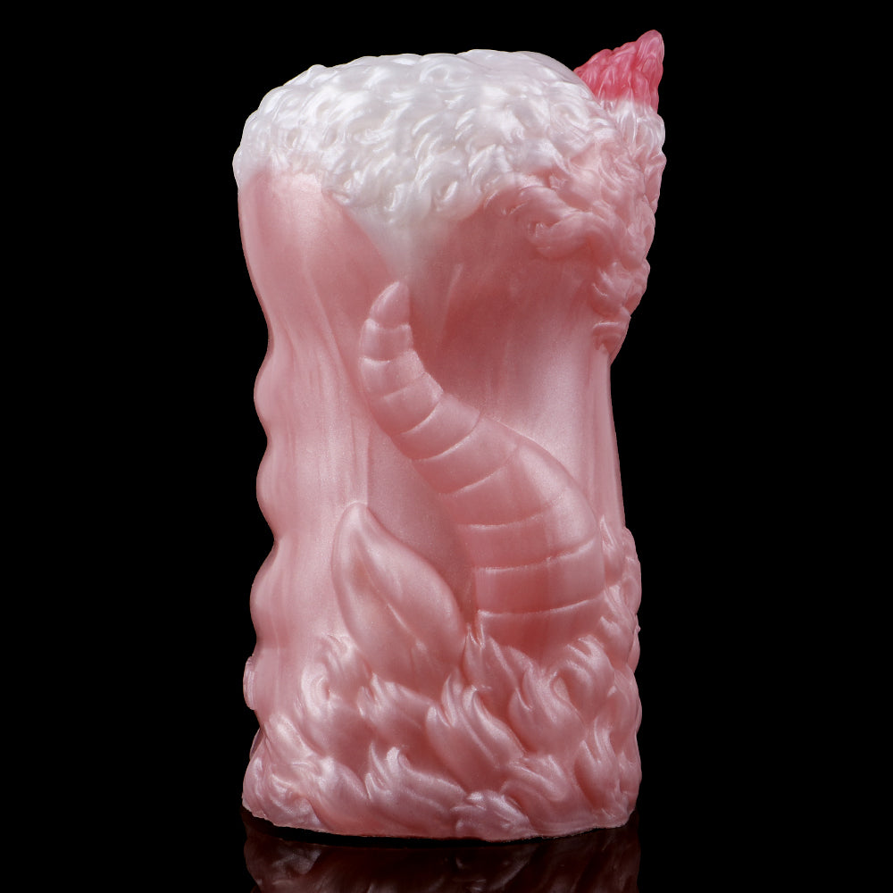 Dragon stroker side view, sculpted scales and raised ridges, light pink.