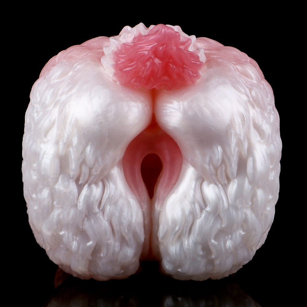 Dragon stroker front opening, ridged textured surface in pink and white.