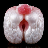 Dragon stroker front opening, ridged textured surface in pink and white.